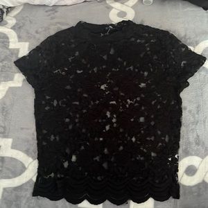 Black, cover skirt. Mesh, cute over a tank top.